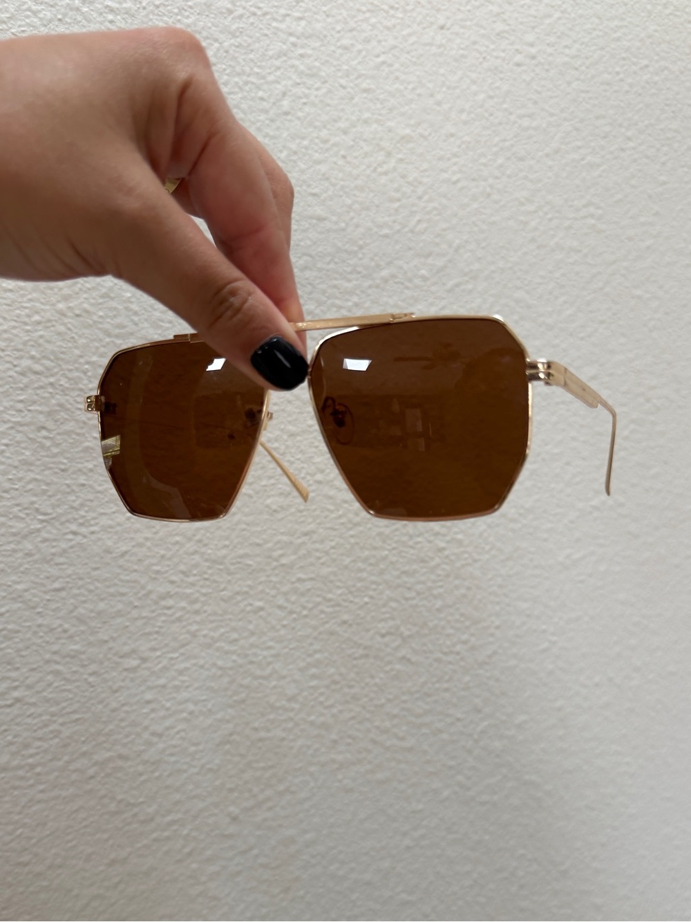 gold and brown aviator sunglasses